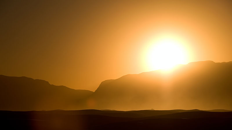 Sun-over-hill.jpg